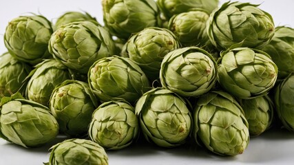 Fototapeta premium Fresh green hop cones for brewing and culinary uses vibrant organic cluster on white background