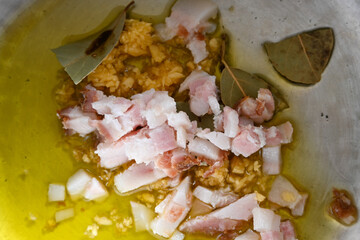 Pan with seasoning to prepare beans