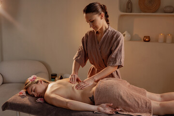 Professional Relaxing Massage by Female Therapist in Spa for Wellness, Health, and Stress Relief