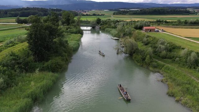 Aerial view of tranquil river and boats, Switzerland.