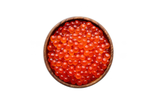 Overhead view of bright red salmon roe in a wooden bowl against caviar fish