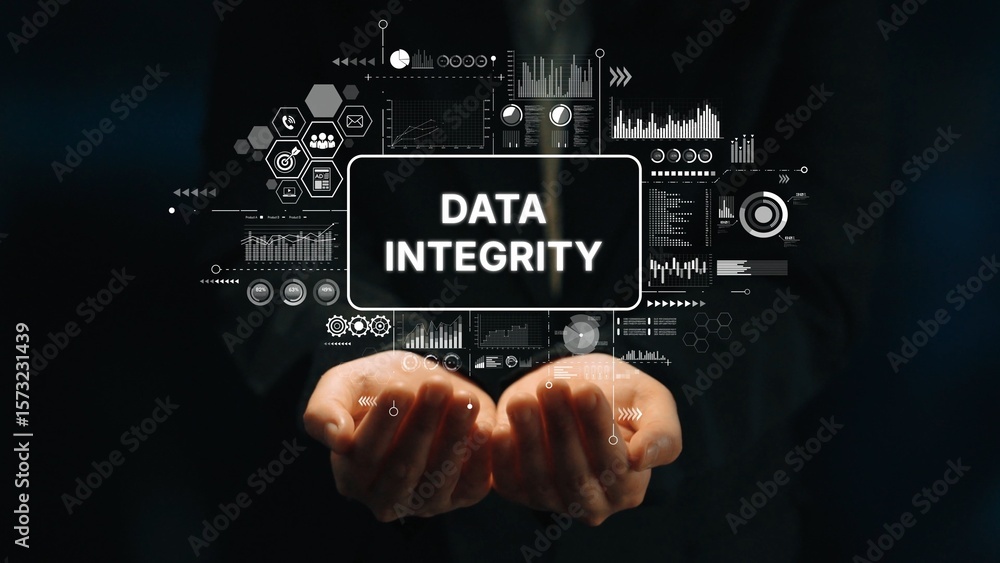 Poster hands holding data integrity concept with digital graphics and visual elements amidst dark backgroun