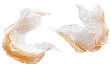 Two light beige, translucent, textured splashes, resembling liquid or fabric, in mid-air against a white background