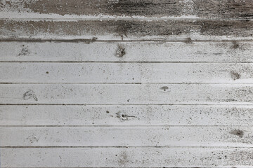 Close up of old stucco cracks on the wall, Old cracked paint on the concrete wall, Weathered paint...