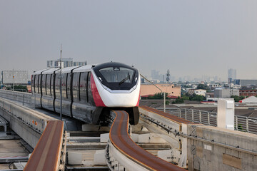 The pink monorail Mass Transit System serving in the Metropolitan Region.