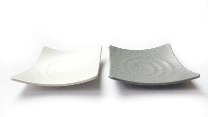 Empty square white and grey plates with ceramic melamin material isolated on white background
