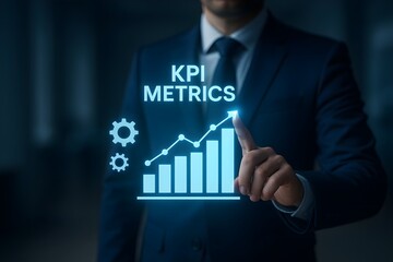 A businessman interacts with a digital interface displaying a growth graph and KPI metrics, indicating progress and success.