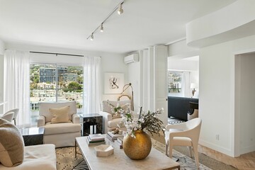 Stylish High-Rise Condo with City Views, Modern Kitchen, and Elegant Light-Filled Living Spaces