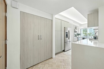 Stylish High-Rise Condo with City Views, Modern Kitchen, and Elegant Light-Filled Living Spaces