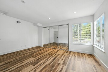 Remodeled Condo with Community Pool, Modern Kitchen, and Light-Filled Open Interiors