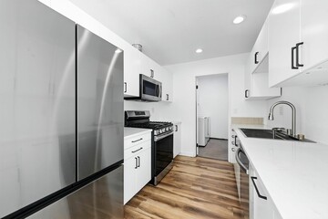 Remodeled Condo with Community Pool, Modern Kitchen, and Light-Filled Open Interiors