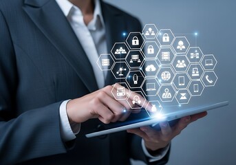 Business Professional Interacting with Digital Security Network Overlay on a Tablet Device
