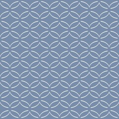 A geometric pattern of interlocking circles creates a sophisticated lattice design against a dark background. The symmetrical arrangement forms a visual rhythm that is both modern and elegant.