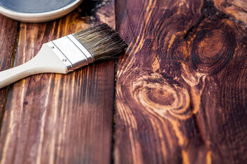 The procedure for protecting and coating wooden boards. The texture of wood treated with stain....