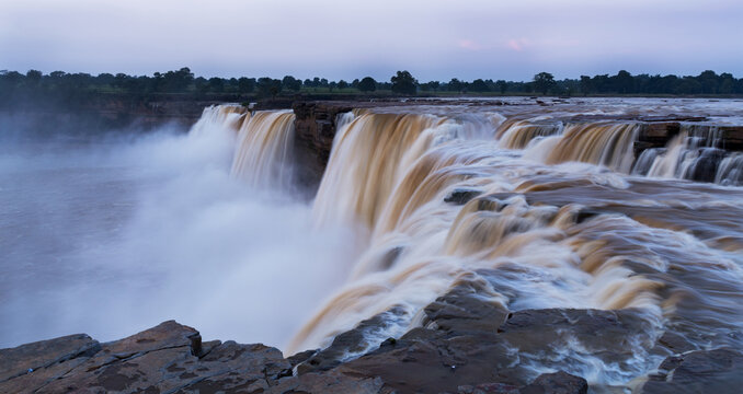 A close view from the top of the beautiful Chitrakote Waterfall located in the Indian state of Chhattisgarh on the Indravati River during post monsoon season