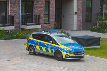 German Police Car Parked in Residential Area © Maksym Hilievoi
