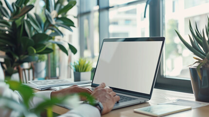 Close-up of hands working on laptop computer at desk. Modern remote work concept, digital lifestyle, freelance productivity, typing and office technology.