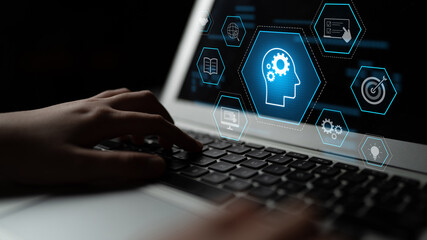 Head with gear and icons representing learning, digital training, and development process, showing...