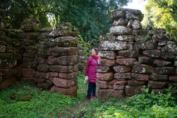 Elder woman sightseeing in the ruins of San Ignacio, Misiones, Argentina
