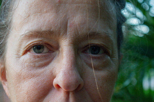 Close up of a senior woman with blue eyes