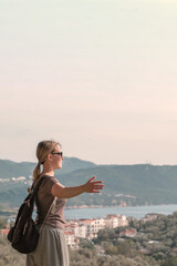 ourney, young woman embarks solo journey, middle breathtaking mountain panorama. Embracing self-care digital nomad lifestyle, freedom, adventure and personal growth