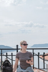 ourney, young woman embarks solo journey, middle breathtaking mountain panorama. Embracing self-care digital nomad lifestyle, freedom, adventure and personal growth