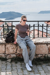ourney, young woman embarks solo journey, middle breathtaking mountain panorama. Embracing self-care digital nomad lifestyle, freedom, adventure and personal growth