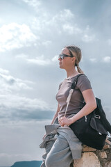 ourney, young woman embarks solo journey, middle breathtaking mountain panorama. Embracing self-care digital nomad lifestyle, freedom, adventure and personal growth