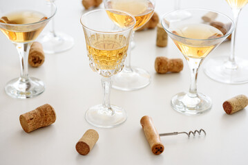 Set of glasses of yellow wine at wine tasting