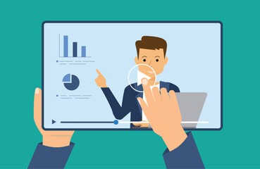 Watching a video, course, webinar, tutorials online. Hand holding a tablet with a video player