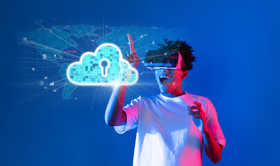 A young man joyfully interacts with a virtual reality headset, exploring innovative cloud technology and digital services in a vibrant, modern digital landscape. XDMCP