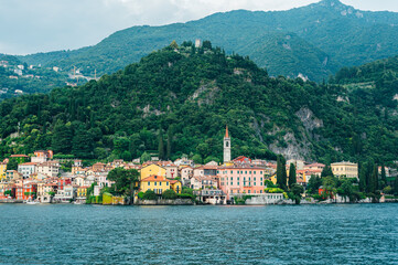 Beautiful Varenna waterfront on a sunny summer afternoon shoot from the water, Lake Como, Lombardy, Italy