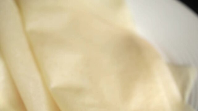 Dough brik raw thin sheet packaging dough phyllo fresh gourmet food background on the table rustic food top view copy space