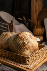 Healthy, organic, whole and sliced ​​homemade sourdough bread with ham and cheese on a wooden...