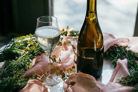 Sparkling wine served for a celebration in a bar or a restaurant.