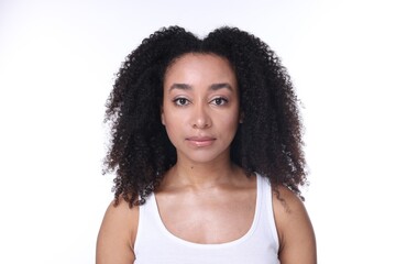 Beautiful Brazilian woman with healthy skin on white background