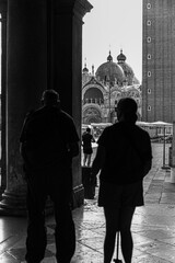 A Silhouetted Couple Admiring Saint Mark's Basilica in Venice