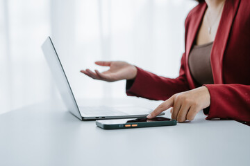 Close up image of woman hands typing, working on laptop computer keyboard from home office