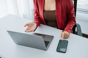 Close up image of woman hands typing, working on laptop computer keyboard from home office
