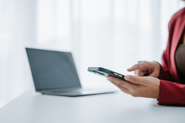 Close up image of woman hands typing, working on laptop computer keyboard from home office