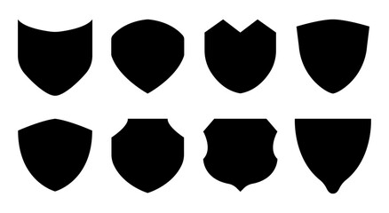 Black silhouette set of shields. Heraldic emblems with various shapes. Medieval design, security icons, vintage labels, badges, logos. Vector isolated on white