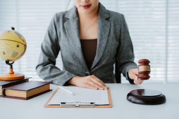 Judge gavel with Justice lawyers, Businessman in suit or lawyer working on a documents. Legal law,...