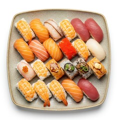 Variety of Japanese sushi including nigiri, maki rolls, and sashimi, beautifully arranged on a ceramic serving plate.