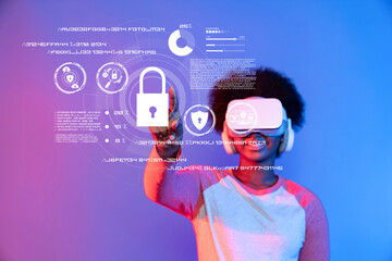 A person using virtual reality technology interacts with holographic cybersecurity elements,...