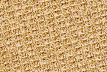 Brown cotton waffle fabric texture as background