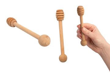 Honey dipper in woman hand isolated on a white background.