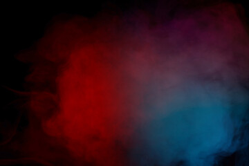 Blue and purple steam on a black background.