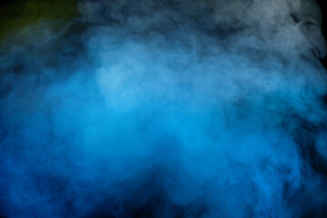 Blue and yellow steam on a black background.