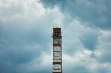 Abandoned Industrial Smokestack Against Stormy Sky - Urban Decay Atmosphere