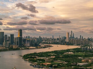 Shanghai skyline and Huangpu River at sunset.
